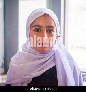 SKARDU, PAKISTAN - APRIL 17: An unidentified Children in village in the south of Skardu are learning in classroom of the village school April 17, 2015 Stock Photo