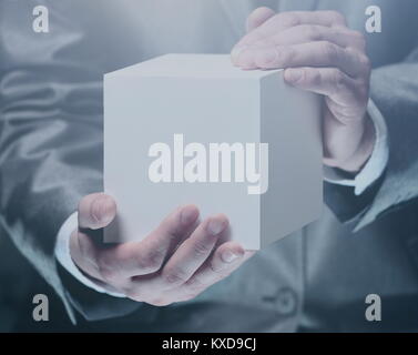 Cube in the male hands Stock Photo