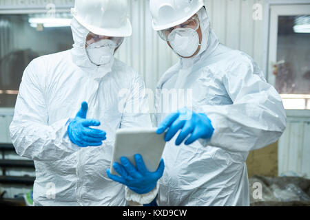 Workers at Modern  Trash Processing Plant Stock Photo