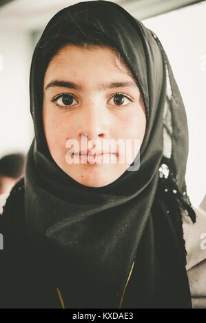 SKARDU, PAKISTAN - APRIL 17: An unidentified Children in village in the south of Skardu are learning in classroom of the village school April 17, 2015 Stock Photo