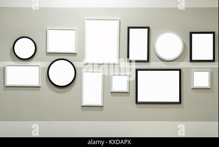 Different size of black and white photo frame on wall Stock Photo