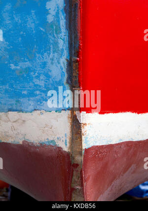 An abstract view of the bow of a boat, painted in blocks of different colours. Stock Photo