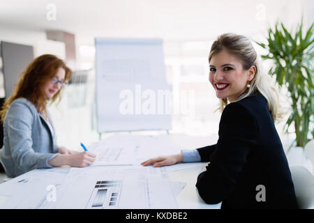 Portrait of young architect woman on meeting Stock Photo