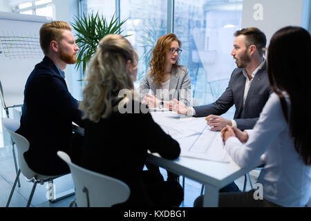 Group of architects working together on project Stock Photo
