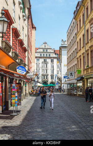 Munich, Germany - May 29, 2016: Downtown street view with cafe, restaurant in Munich, Bavaria, Germany.