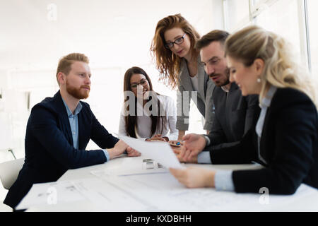 Group of architects working together on project Stock Photo
