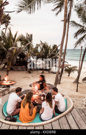 People enjoying beach at Papaya Playa Resort in Tulum, Mexico Stock Photo
