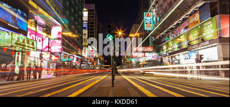 HONG KONG - FEBRUARY 21: Public transport lights on the street on February 21, 2013 in Hong Kong. Over 90% daily travelers use public transport. Its t Stock Photo