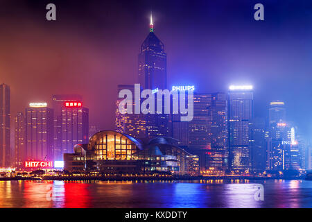 HONG KONG - MARCH 19: Victoria Harbor in Hong Kong on March, 19, 2013. The Victoria Harbour is world-famous for its stunning panoramic night view and  Stock Photo