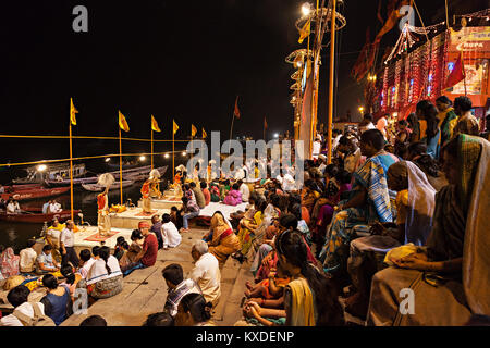 VARANASI, INDIA - APRIL 11: An unidentified Hindu priest performs religious Ganga Aarti ritual (fire puja) at Dashashwamedh Ghat on April 11, 2012 in  Stock Photo