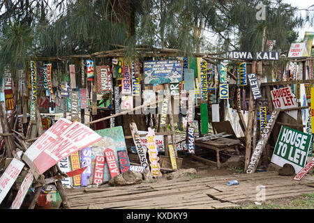 Wooden signs, for sale, on Ngong Road, Nairobi, Kenya Stock Photo