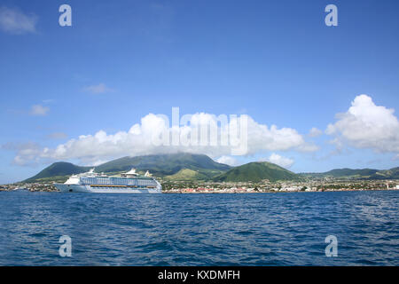 The island of St Kitts, with beautiful landscape & a Cruise ship anchored off the shore, Basseterre, St Kitts, Caribbean. Stock Photo