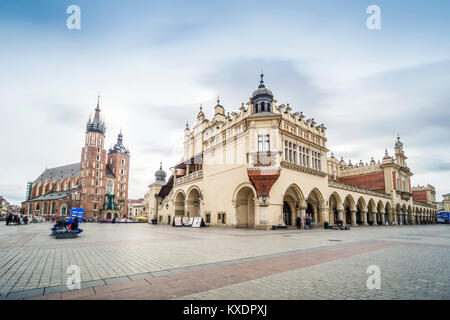 Cloth Hall and St. Mary's Basilica on main Market Square in Krakow, Poland Stock Photo