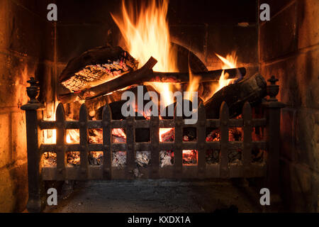 Wood Fire Burning in a Traditional Country Fireplace Stock Photo