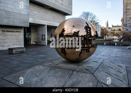 Sphere with Sphere by Arnaldo Pomodoro, Trinity College, Dublin, Ireland Stock Photo