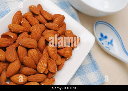 Almond used as food ingredients in Chinese desserts and cuisine. For food and beverage, and nutritional concepts. Stock Photo