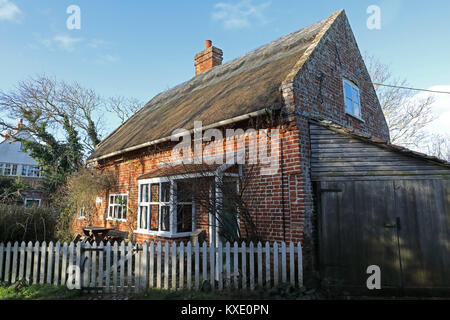 thatched cottage  Waxham, Norfolk, UK         January Stock Photo