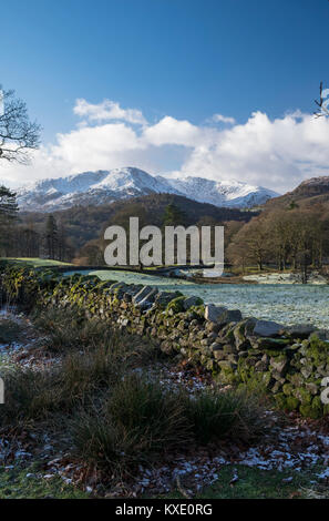 Wetherlam in snow from near Loughrigg, Lake District, England Stock Photo