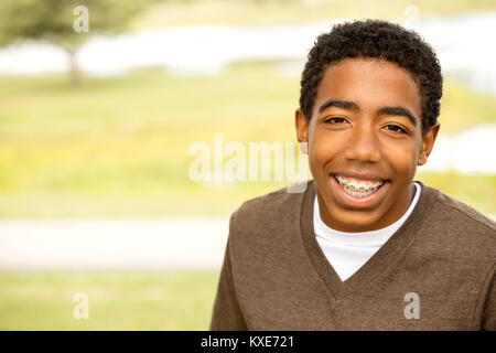 Young teen smiling. Stock Photo