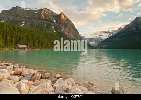 Landscape view of Lake Louise with snowy mountains and glacier in background. Stock Photo