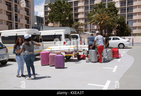 Cape Town South Africa. December 2017, Holidaymakers luggage being loaded for transportation to the next destination Stock Photo