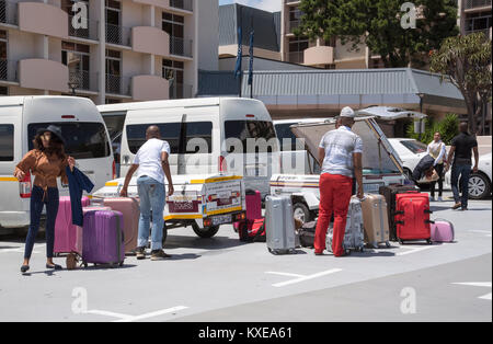 Cape Town South Africa. December 2017, Holidaymakers luggage being loaded for transportation to the next destination Stock Photo