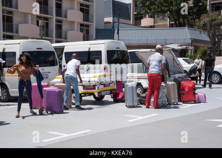 Cape Town South Africa. December 2017, Holidaymakers luggage being loaded for transportation to the next destination Stock Photo