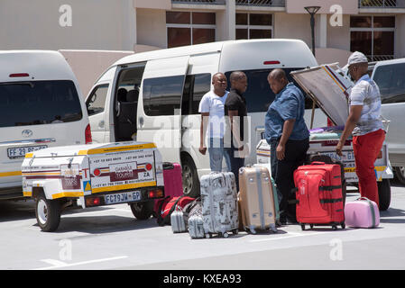 Cape Town South Africa. December 2017, Holidaymakers luggage being loaded for transportation to the next destination Stock Photo