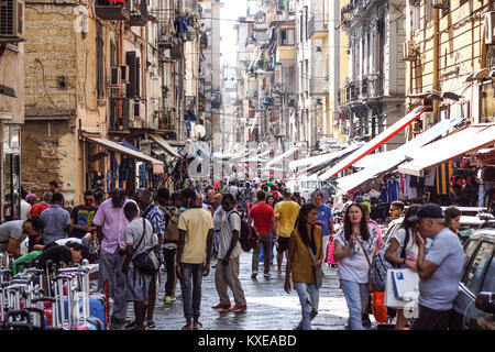 NAPLES, ITALY - AUGUST 22: Porta Nolana Market in Naples on AUGUST 22, 2017. Local People Shopping at Sunday Street Market in Napoli, Italy. Stock Photo