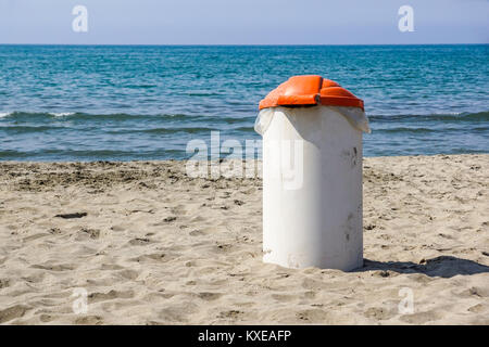 Trash can on the beach sunny day. Concept photo of a clean beach Stock Photo