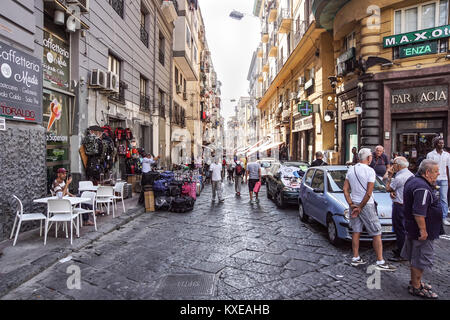 NAPLES, ITALY - AUGUST 22: Porta Nolana Market in Naples on AUGUST 22, 2017. Local People Shopping at Sunday Street Market in Napoli, Italy. Stock Photo