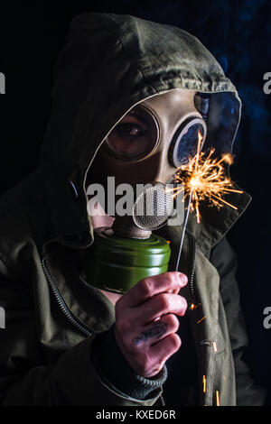 Studio shot depicting an post-apocalyptic scavenger in some underground location. Stock Photo