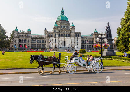 Horse-drawn carriage in Victoria known as the Garden City on Vancouver Island in British Columbia, Canada Stock Photo