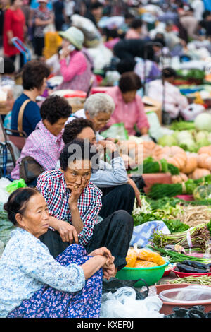 Market vendors in Busan vegetable market, South Korea. Stock Photo