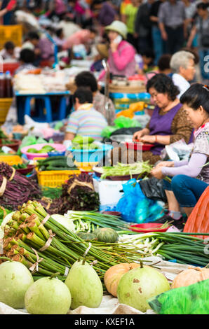 Market vendors in Busan vegetable market, South Korea. Stock Photo