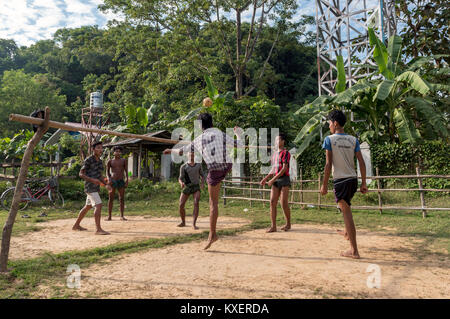 Villagers play a game of Sepak Takraw in Mrauk U,Burma,Myanmar Stock Photo