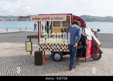 Mini van selling wine to visitors to Padrao dos Descobrimentos on Avenue Brasilia in Lisbon, Portugal Stock Photo