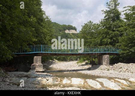 Blue Bridge over the River Dede in village Dederkoy, Tuapse district, Krasnodar Region, Russia Stock Photo