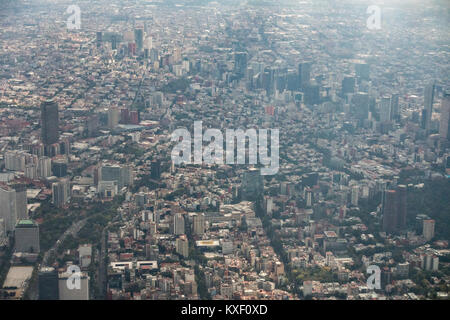 Aerial view showing the haze of pollution over the skyscrapers along Paseo de la Reforma from Chapultepec Park October 25, 2017 in downtown Mexico City, Mexico. Mexico City is the capital of Mexico and and the most populous city North America. Stock Photo