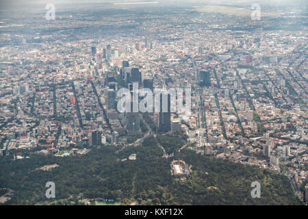 Aerial view showing the haze of pollution over the skyscrapers along Paseo de la Reforma from Chapultepec Park October 25, 2017 in downtown Mexico City, Mexico. Mexico City is the capital of Mexico and and the most populous city North America. Stock Photo