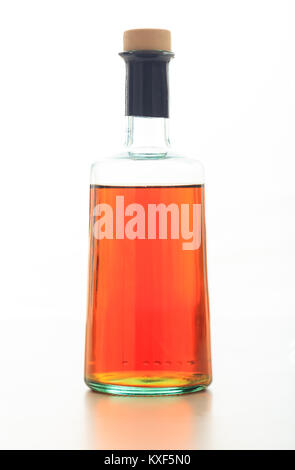 Bottle of red vinegar on white background Stock Photo