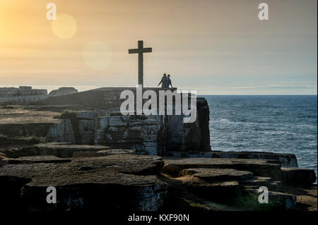 cross on top of the cliffs at Cabo Carvoeiro, Peniche on the Silver Coast, Portugal. Stock Photo