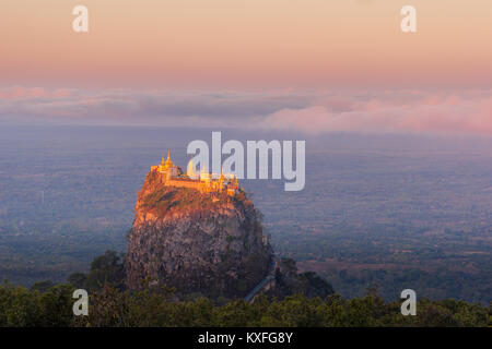 Taung Kalat Monastery on Mt. Popa, Myanmar at sunrise Stock Photo