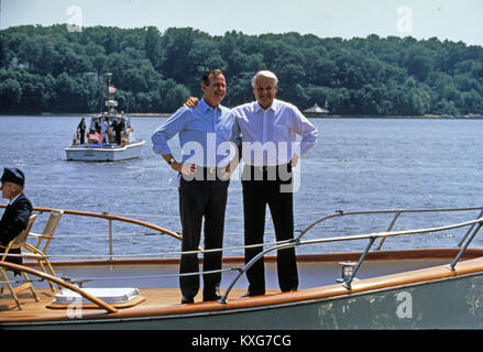 Severn River, Maryland, USA. 17th June, 1992. United States President George H.W. Bush, left, and President Boris Yeltsin of the Russian Federation, right, on the deck as they take a boat ride on the Severn River in Maryland on June 17, 1992. Credit: Ron Sachs/CNP Credit: Dennis Brack/CNP/ZUMA Wire/Alamy Live News Stock Photo