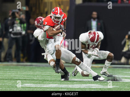 Atlanta, Georgia, USA. 8th Jan, 2018. Georgia running back D'Andre Swift (7) runs with the ball as Alabama linebacker Mack Wilson (30) makes the tackle during College Football Playoff National Championship game action between the Alabama Crimson Tide and the Georgia Bulldogs at Mercedes-Benz Stadium in Atlanta, Georgia. Alabama defeated Georgia 26-23 in Atlanta, Georgia, USA. Credit: Cal Sport Media/Alamy Live News Stock Photo