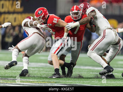 Atlanta, Georgia, USA. 8th Jan, 2018. Georgia running back D'Andre Swift (7) runs with the ball as Alabama defensive lineman Raekwon Davis (99) attempts to make the tackle during College Football Playoff National Championship game action between the Alabama Crimson Tide and the Georgia Bulldogs at Mercedes-Benz Stadium in Atlanta, Georgia. Alabama defeated Georgia 26-23 in Atlanta, Georgia, USA. Credit: Cal Sport Media/Alamy Live News Stock Photo