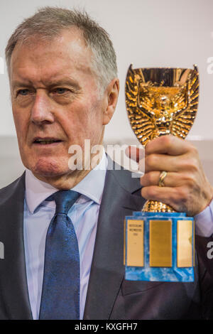 London, UK. 10th Jan, 2018. Sir Geoff Hurst and the Jules Rimet trophy at the Sunseeker launch and announcement of the partnership with FIFA for the 2018 World Cup - The London Boat Show 2018 opens at the Excel centre in the Docklands. Credit: Guy Bell/Alamy Live News Stock Photo