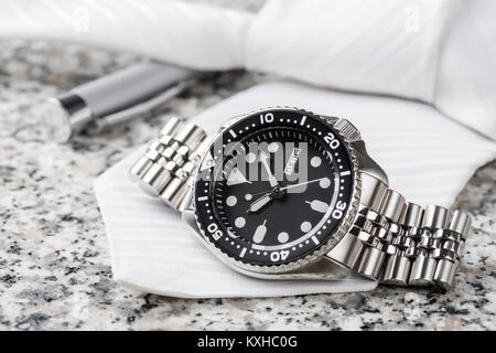 closeup men dive watch with stainless steel bracelet Stock Photo