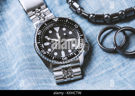 closeup men dive watch with stainless steel bracelet Stock Photo