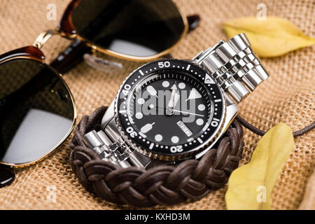 closeup men dive watch with stainless steel bracelet Stock Photo